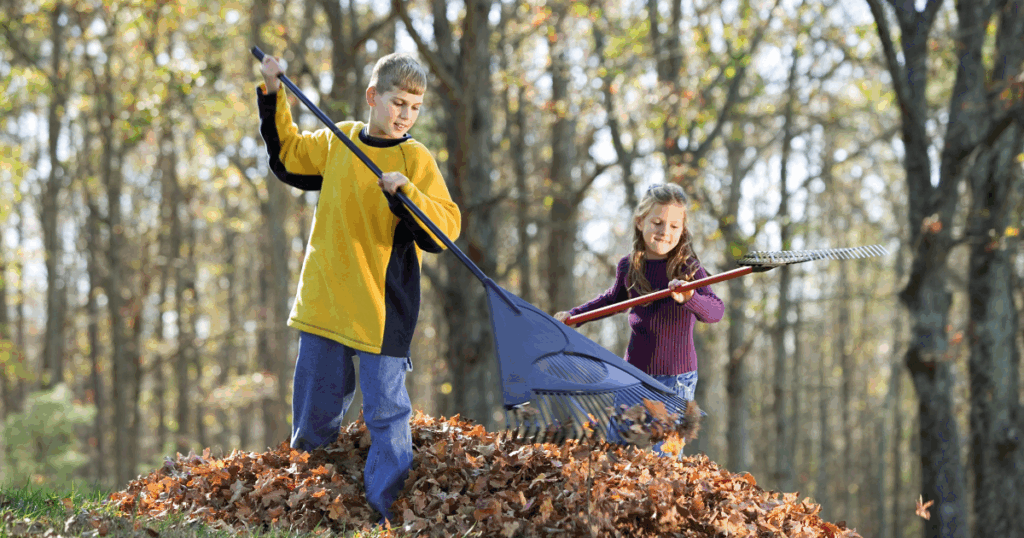 children raking leaves