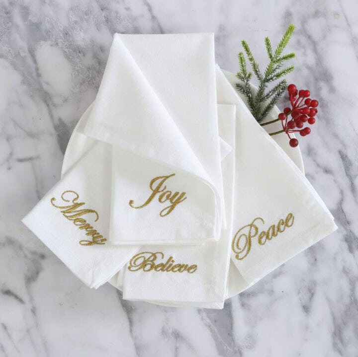 white cotten believe holiday napkin set