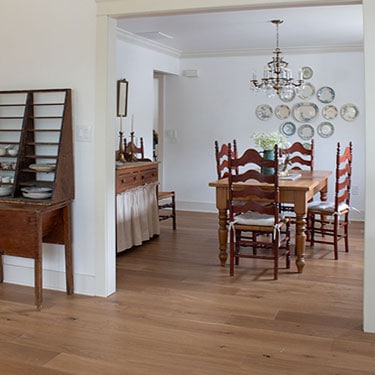 Our Warm-Toned Engineered Hardwood Floors (And How We Matched the Old Ones)