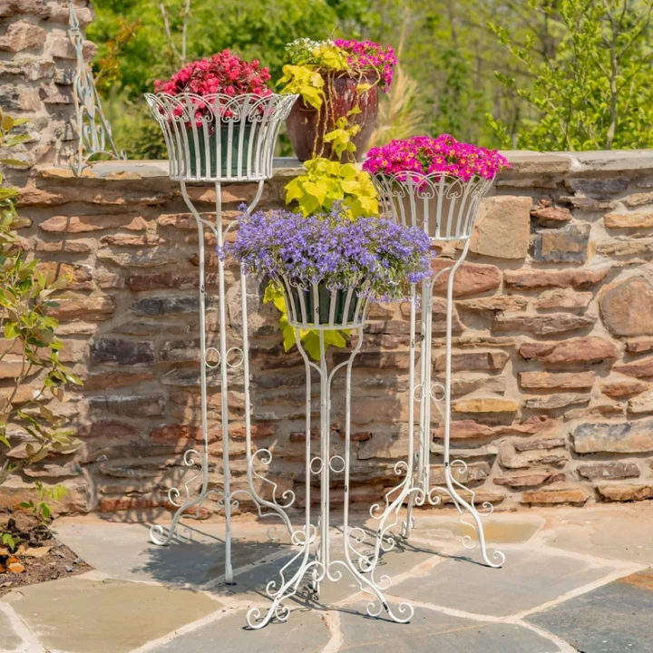 set of three white plant stands
