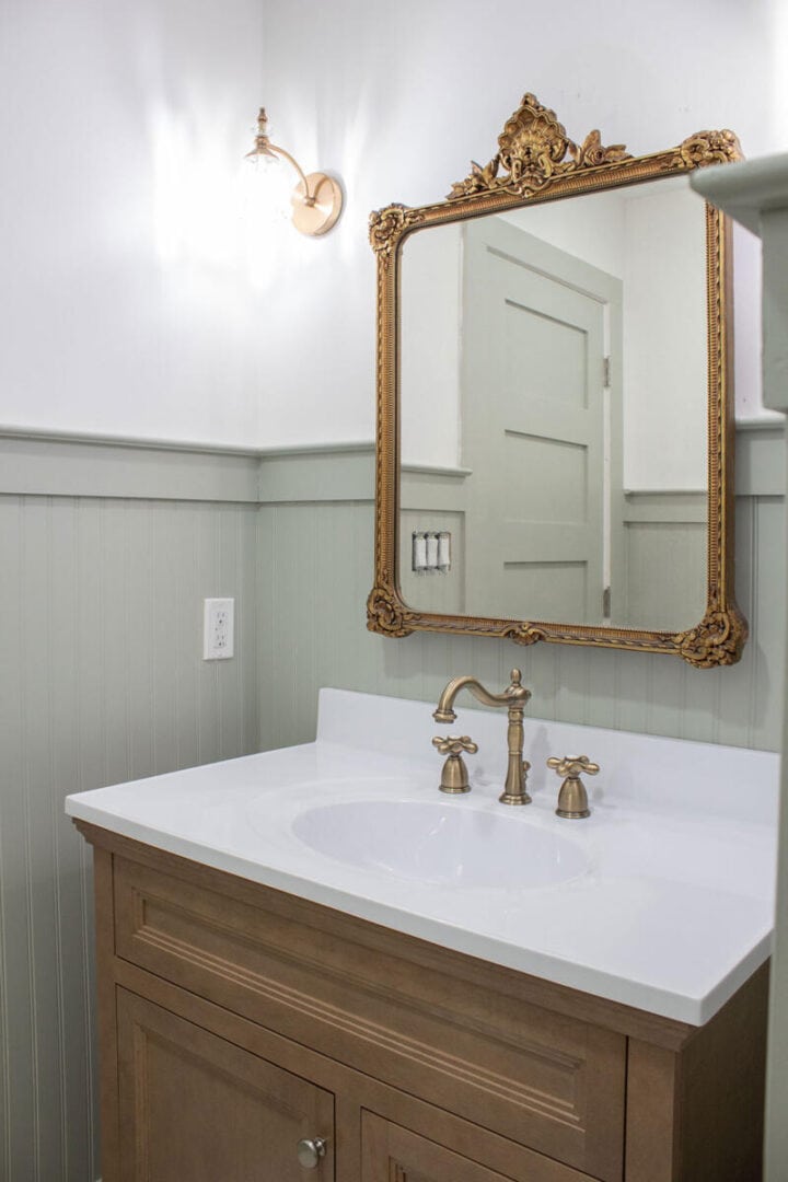 small-bathroom-with-wood-vanity-green-paint-and-beadboard-720x1080-1 small-bathroom-with-wood-vanity-green-paint-and-beadboard